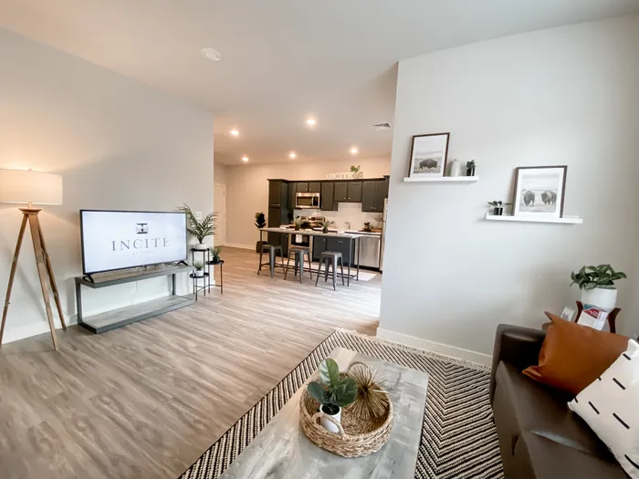 Kitchen & Lounging Area in Clubhouse at Incite at Troy | Off-Campus Housing in Troy, NY