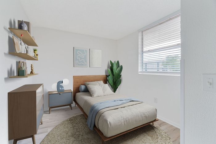 Bright and modern bedroom with chic decor, featuring a cozy bed, stylish shelving, and natural light streaming through a large window.