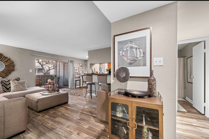 Lakeside at Campeche 2 bed 2 bath model front entrance looking into living room dinigroom and guest bathroom