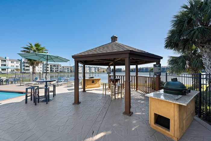 Lakeside at Campeche outdoor kitchen Pavillion with greenegg charcoal grills and ample dining areas