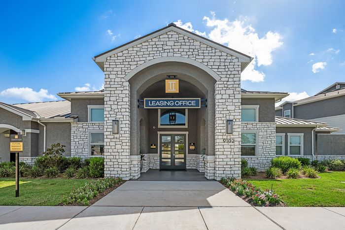 Modern apartment Leasing Office loaded with amenities like complimetary coffee bar, business center, wifi lounge, fitness center, and so much more and sleek design.