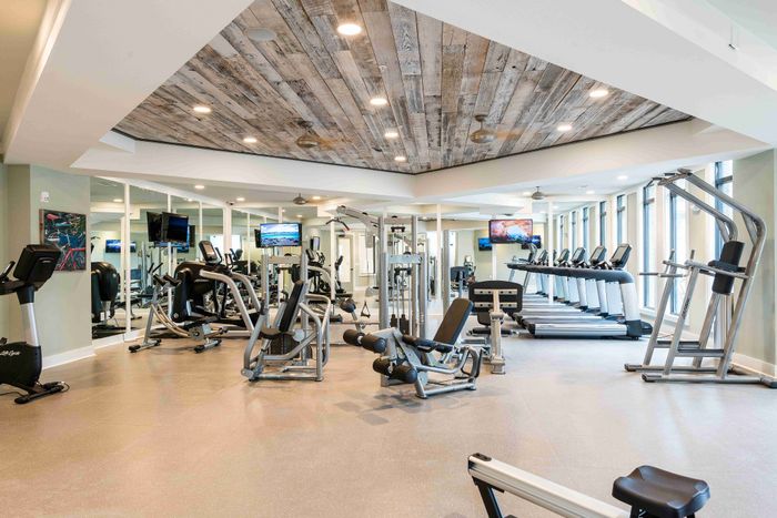 Fitness center at The Heyward with exercise equipment.