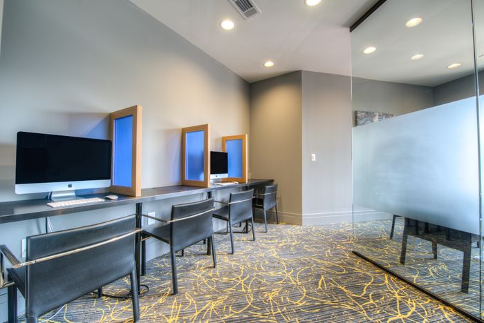 Residents Utilizing Business Center | Apartments for rent in Columbia, SC | Station at Five Points