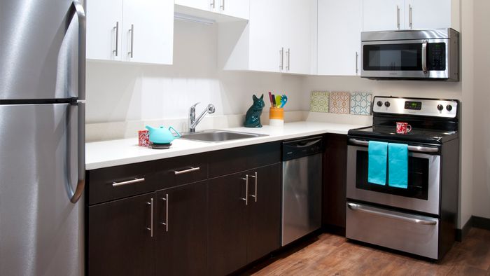Kitchens with stainless steel appliances and utilities and finishes, apartments, Microwave
