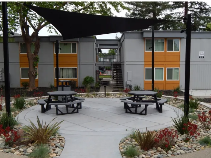 Residents Tanning on the Sun Deck | Apartments Near Sacramento State | University Village