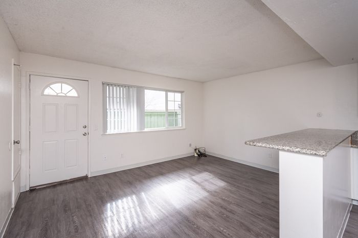 Cottages on 5th (NEW) - Empty Living Area