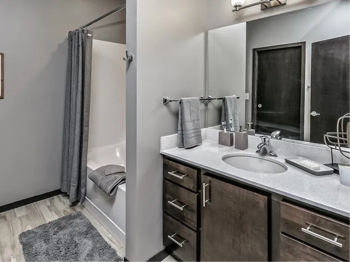 Spacious Bathroom w/ Stunning Wood Finishes