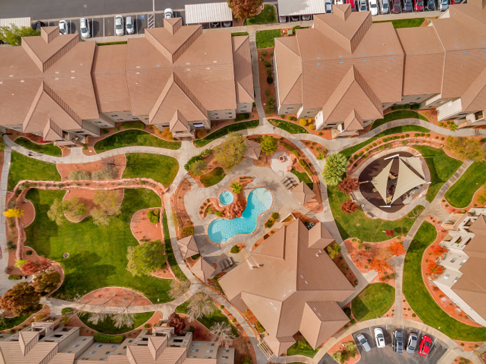 Aerial View of courtyard, pool, and playground