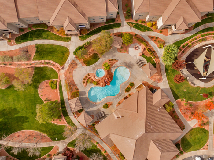 Aerial View of courtyard, pool, and playground