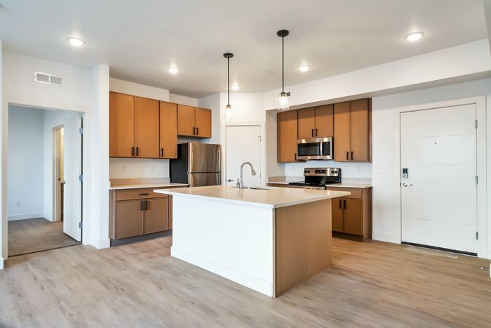 View of the Brighton Kitchen and the entrance of the primary bedroom