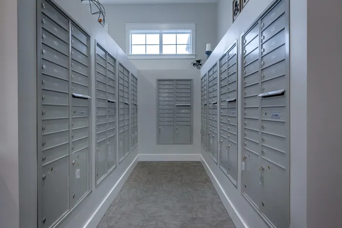 Mailroom, vending machine, trash, and community pin-board