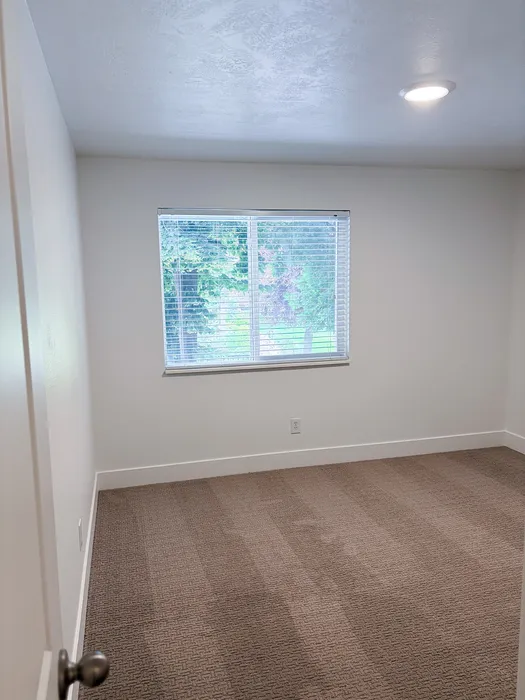 Large bedrooms with fresh finishes and natural light create the perfect retreat.