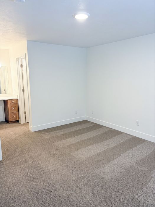 Generously sized bedrooms offer flexibility for work, relaxation, and everything in between.