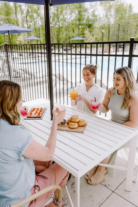 Residents Lounging by the Pool | LC Brier Creek | Apartments in Durham, NC