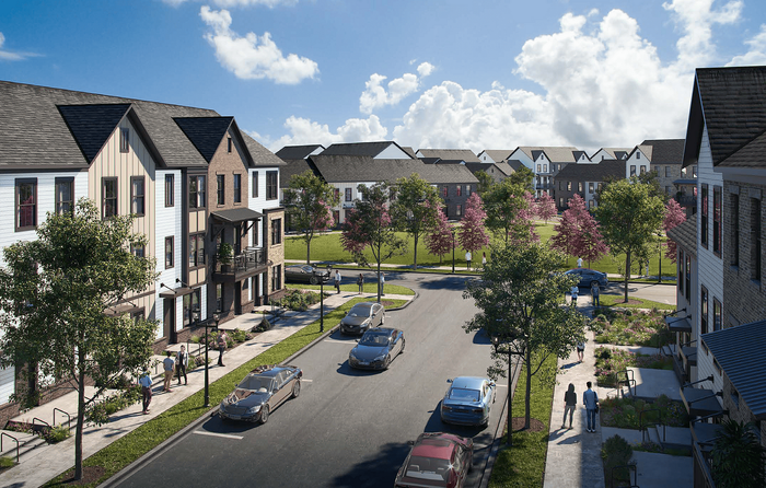 Charming community view showcasing elegant modern townhouses with lush green spaces and scenic streetscape under a bright blue sky.