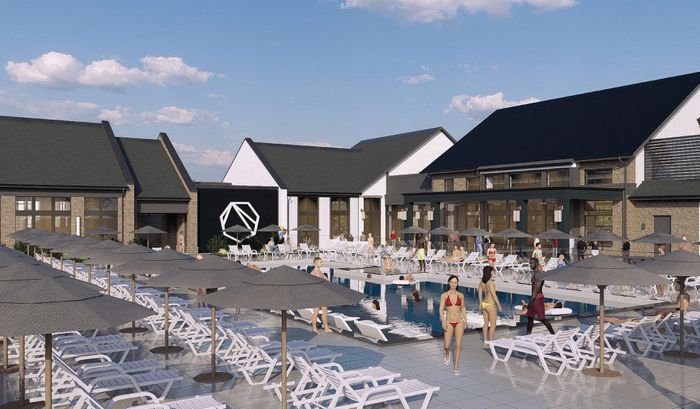 Lively community pool area with stylish lounge chairs, umbrellas, and a modern clubhouse in the background, perfect for relaxing and socializing.