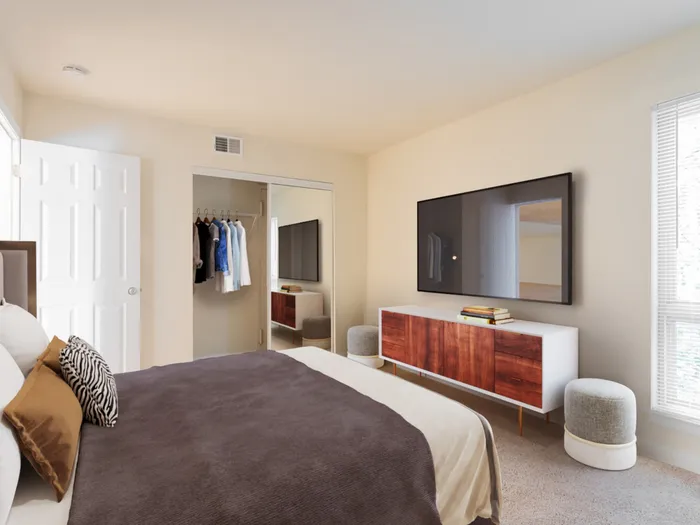 Bedroom with wall to wall carpet, large picture window