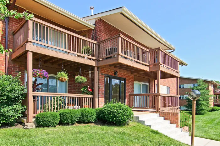 Exterior Brick Apt Building with Balconies and Patio