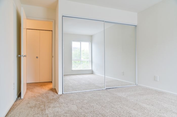 Applegate Apts; Interior, bedroom, plush carpet, mirror closet doors, large window with custom blinds