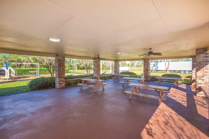 Beach Villas Apartments, exterior, spacious pavilion, picnic tables, ceiling fan,
