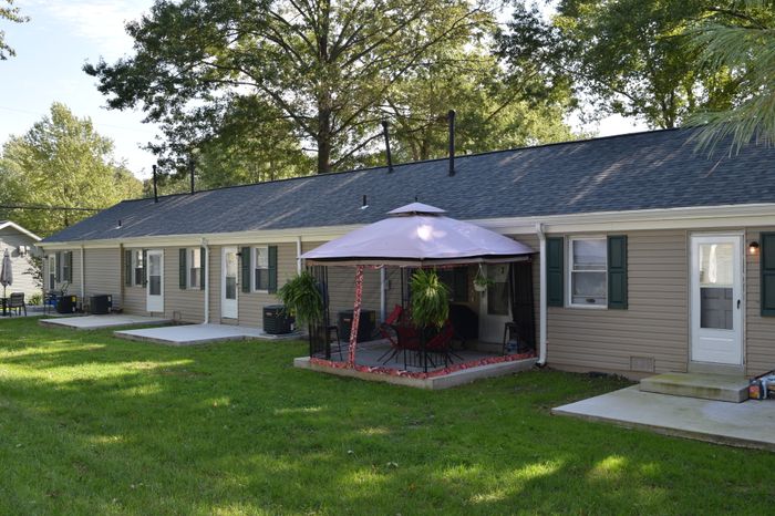 Backside of townhomes, large patios