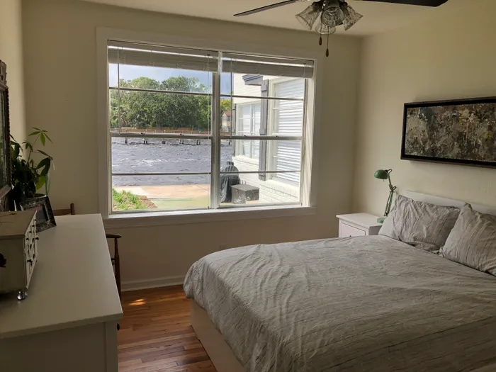 bedroom with large Windows