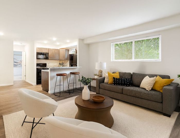 Living Room with Wood Flooring. Open Floorplan.