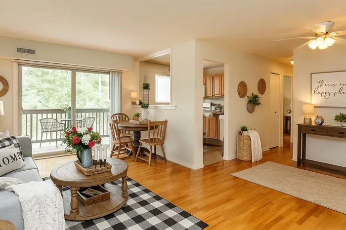 Living room, dining room, kitchen with cut out. Hard wood flooring, balcony