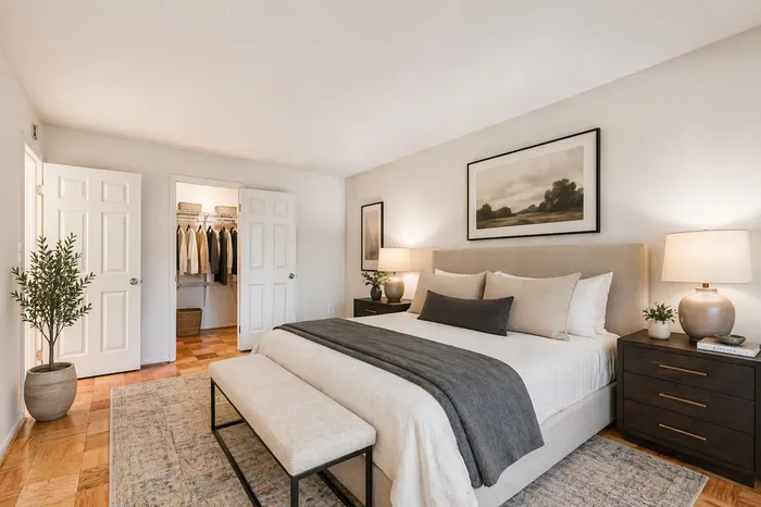 Primary bedroom with walk-in closet