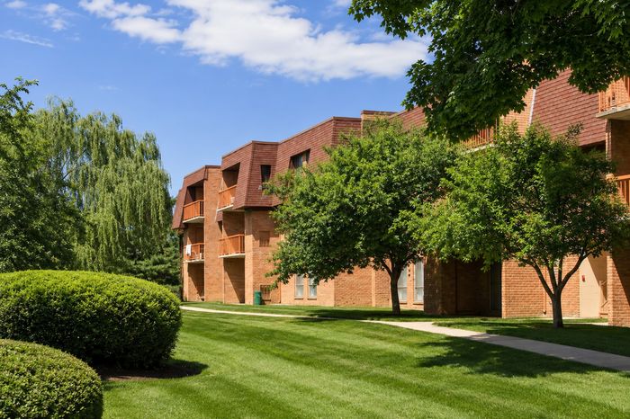 Building exterior and lush landscapes