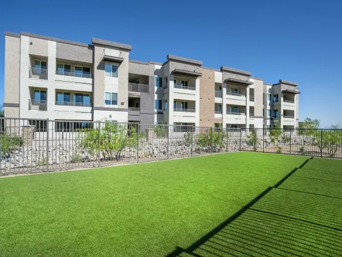Apartments In North Phoenix, AZ With In-Unit Washer And Dryer - Acero North Valley - Fenced In Dog Park With Bright Green Grass