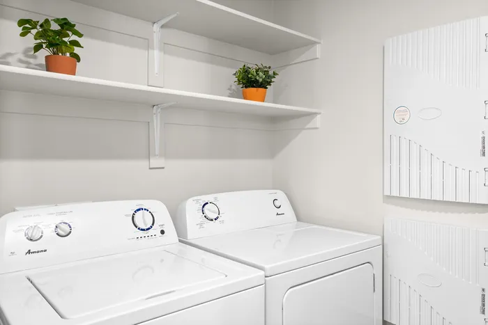 3-BR Apartments In North Phoenix, AZ - Acero North Valley - Laundry Room With In-Unit Washer & Dryer, And Storage Shelves Above