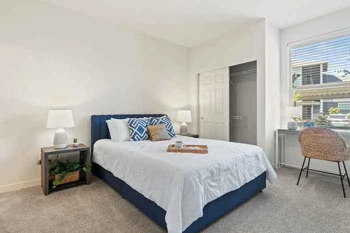 Ridgefield, WA Apartments - Acero Ridgefield - Spacious Bedroom With Plush Carpeting, Closet With Sliding Door, And Window For Bright Natural Light