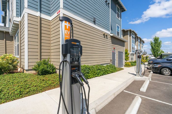 Vancouver, WA Apartments Near Costco - Acero Jensen Park - Charging Station For Electric Cars At Outdoor Parking Lot