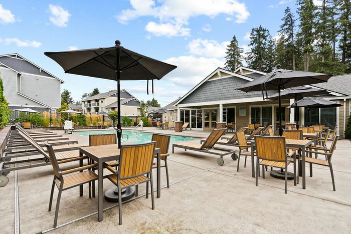Poolside patio with seating