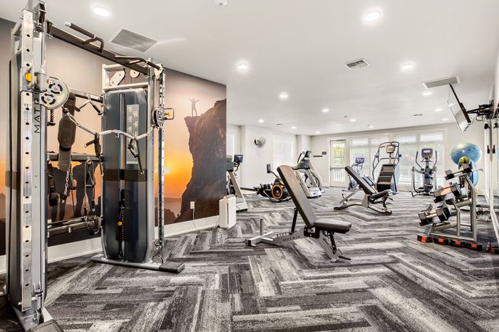 Apartments For Rent In Vancouver, WA - Acero Jensen Park - 24-Hour Fitness Center Equipped With Cardio Machines, Strength Training Machines, Free-Weights, Yoga Balls, TV, Fan, And Full Body Mirror
