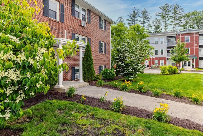 Stroll through our beautifully landscaped grounds featuring walking paths and tranquil outdoor spaces. | Princeton Dover Apartments | Dover Apartments