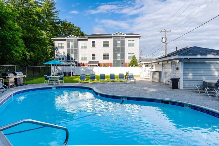 Refresh yourself in our resort-inspired pool with lap lanes, shallow end, and surrounding sun deck. Aquatic paradise found. | Princeton Dover Apartments | Princeton Dover Apartments