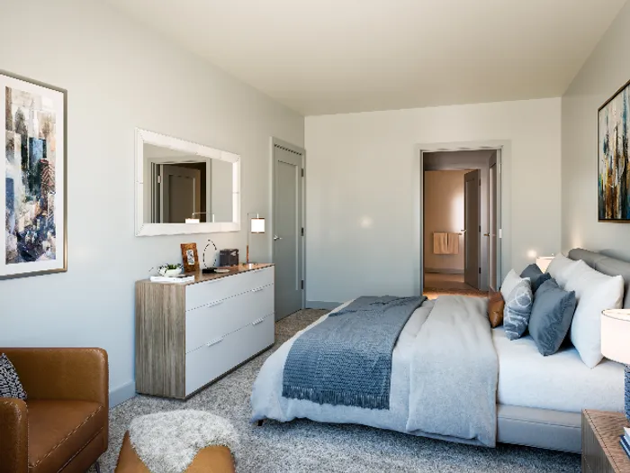 Your primary bedroom suite provides luxurious privacy with ensuite bathroom and walk-in closet convenience.  | The Chandler | Bedford Apartments