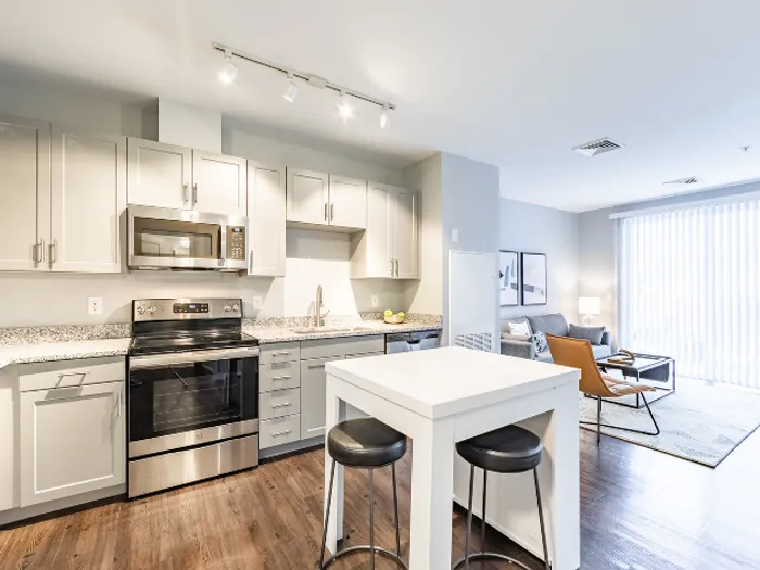 Your kitchen with stainless appliances offers durability and style with coordinated finishes throughout. | The Chandler |  The Chandler Apartments