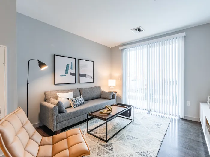 This spacious living room offers plenty of room for relaxation and entertaining with flexible layout options.  | The Chandler |