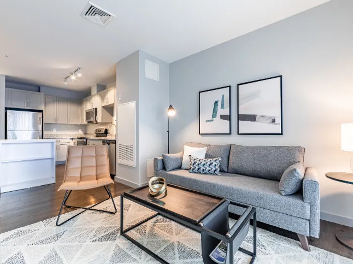 Enjoy a warm and comfortable atmosphere with an expansive open floor plan that is perfect for everyday living and entertaining at our pet-friendly apartments in Bedford, NH. | The Chandler | Apartment in,Bedford NH