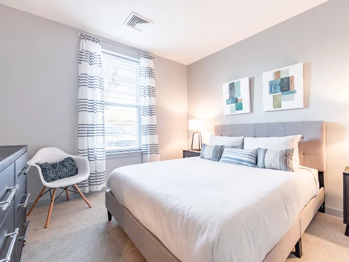 Your comfortable bedroom offers welcoming space with room for furniture, storage, and personal touches.  | The Chandler |  The Chandler Apartments
