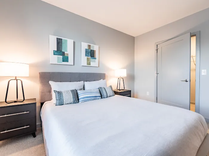 Your primary bedroom suite provides luxurious privacy with ensuite bathroom and walk-in closet convenience.  | The Chandler | Bedford Apartments