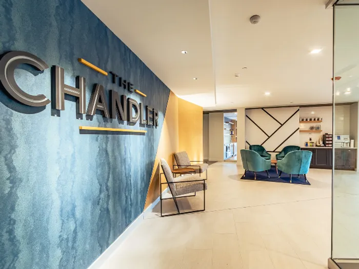 Step into the beautifully designed lobby that creates a warm, inviting atmosphere to welcome you home every day at our scenic apartments in Bedford, NH. | The Chandler | Apartment in,Bedford NH