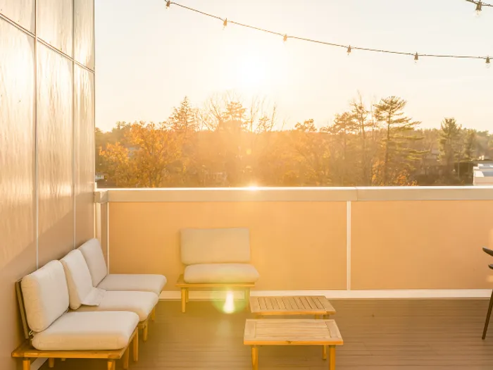 The beautiful roof deck creates a warm and inviting atmosphere perfect for outdoor daily relaxation and taking in the views at our welcoming apartments in Bedford, NH. | The Chandler | Apartment in,Bedford NH