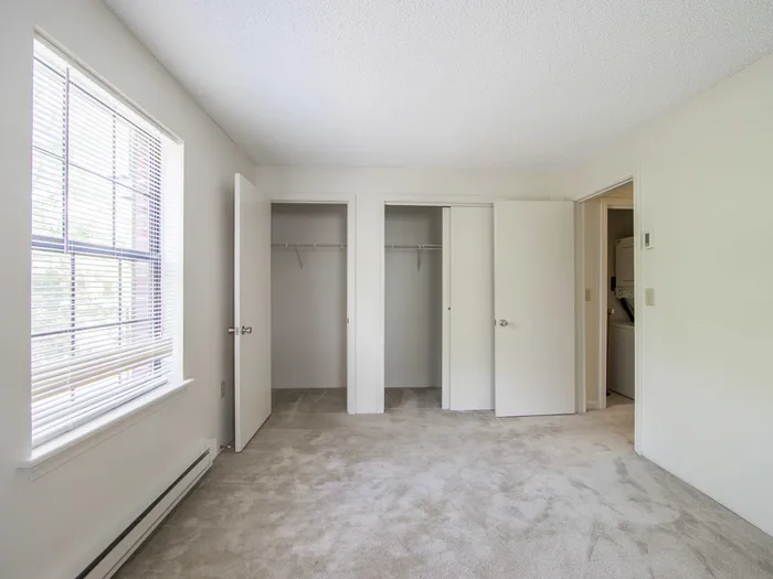 Carpeted bedroom with closets | Princeton Place | Apartment For Rent Worcester MA