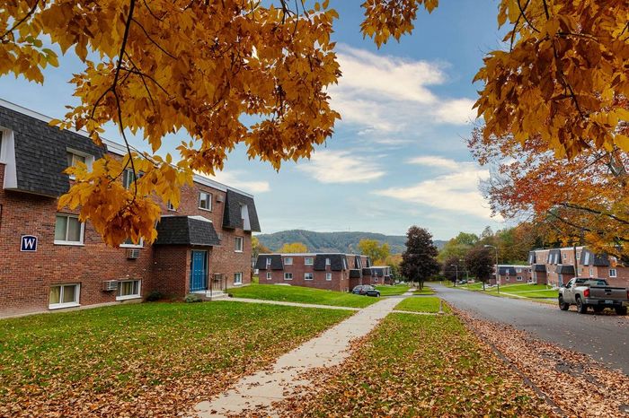 Lush landscaping at Princeton Commons apartment community in Claremont, NH.