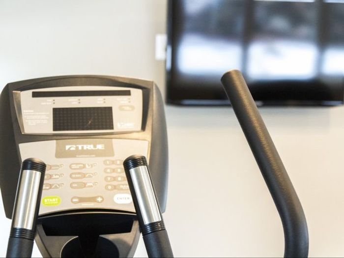 Build strength and endurance in our community fitness center where neighbors come together to pursue their health and fitness journeys. | Princeton Dover Apartments | Princeton Dover Apartments