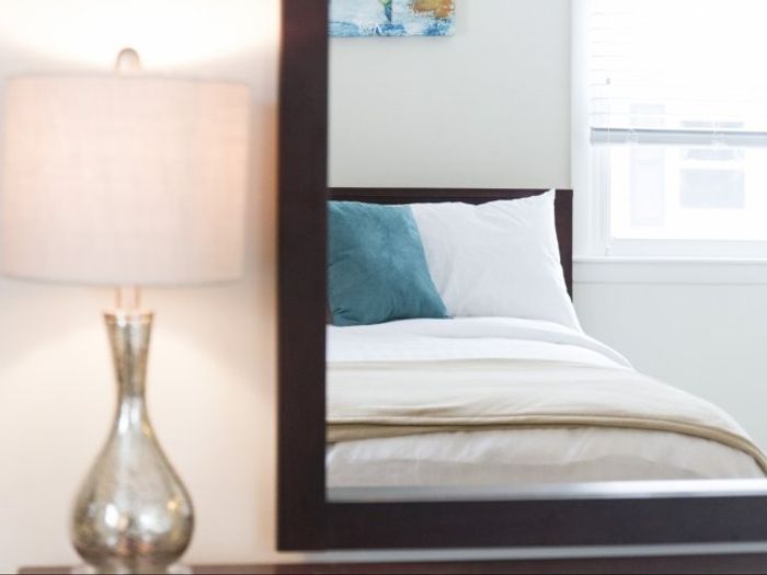 The primary bedroom with walk-in closet offers generous storage space and comfortable sleeping area. | Princeton Dover Apartments |